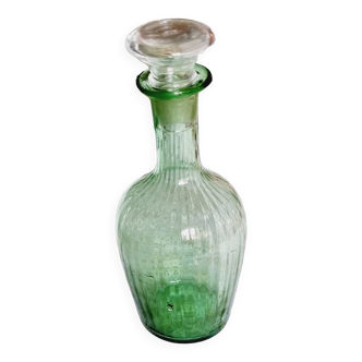Small green blown glass carafe