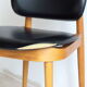 Suite of 6 Chairs Baumann model Pegasus in beech and faux black leather