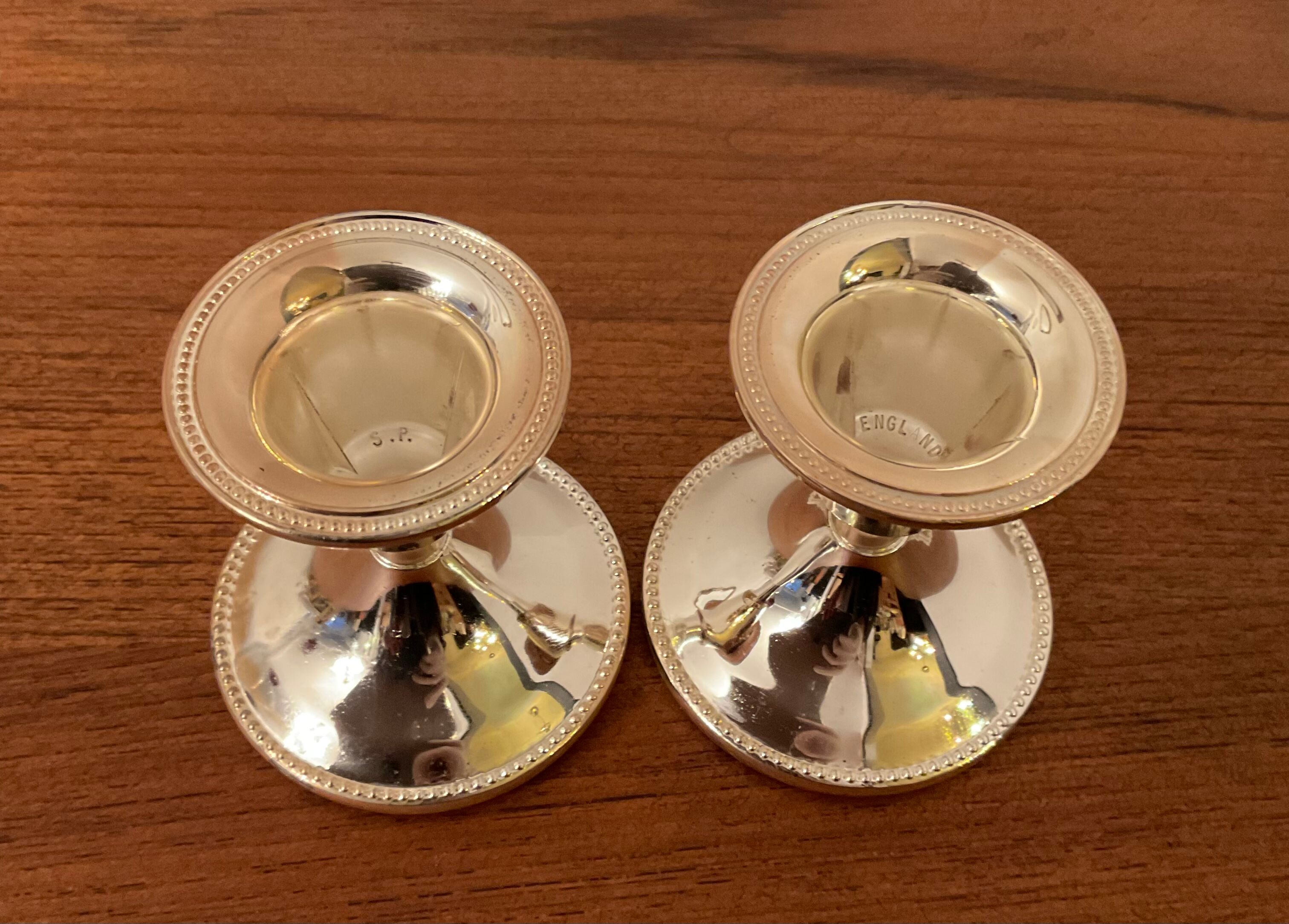 Pair of vintage silver metal candle holders