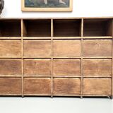 Meuble de métier ancien à 24 casiers