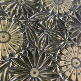 Small decorative chiseled ceramic plate