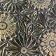 Small decorative chiseled ceramic plate