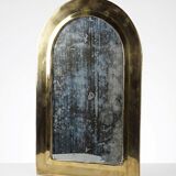 Large vintage Moroccan artisan wall mirror from the 50s-70s, made of solid brass, arch-shaped.