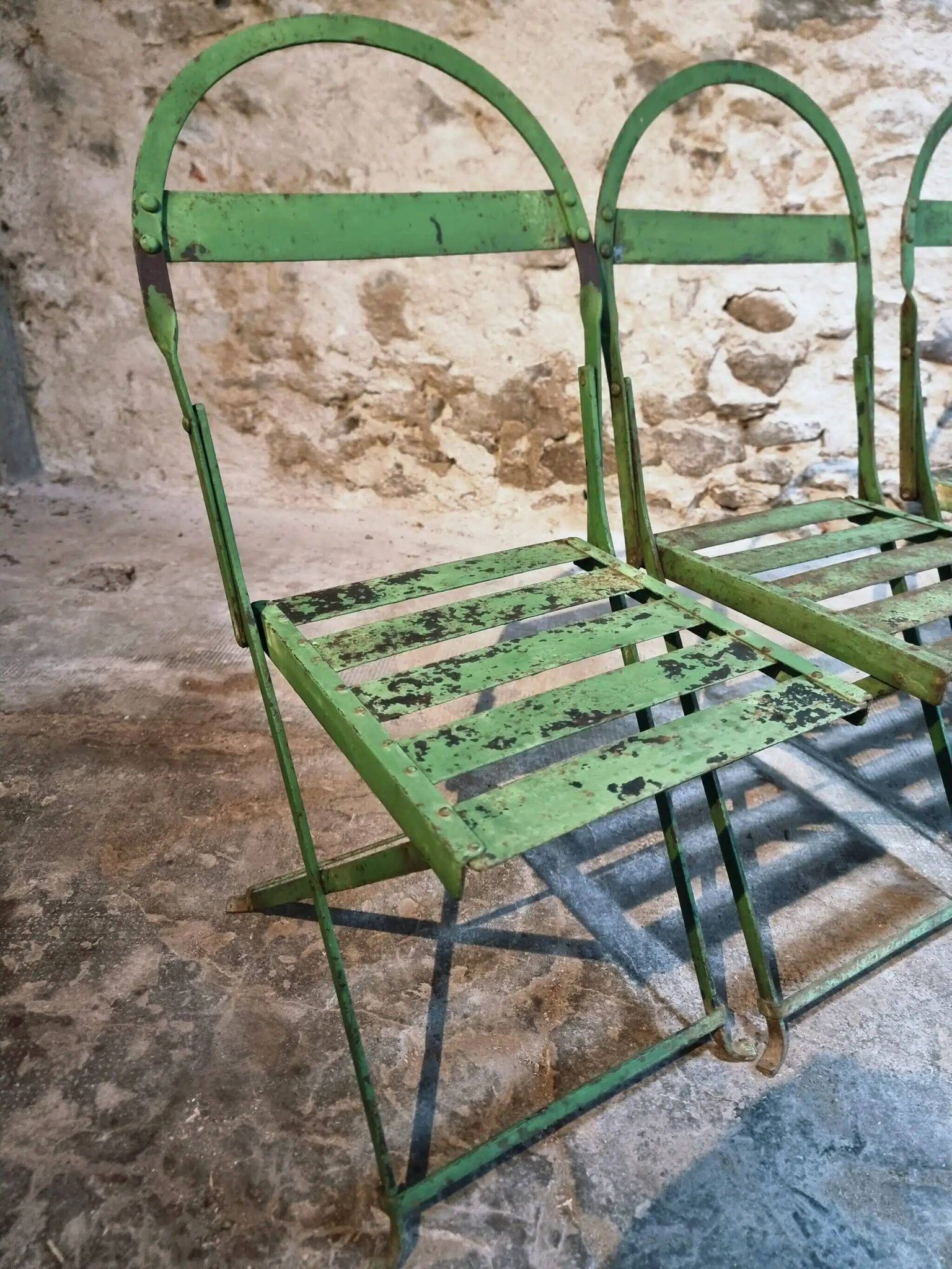 Set of 4 Antique Iron Folding Garden Chairs - 1920s Riveted Bistro Chairs with Aged Green Patina