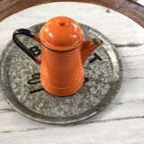 Orange and black enamelled sheet metal coffee maker
