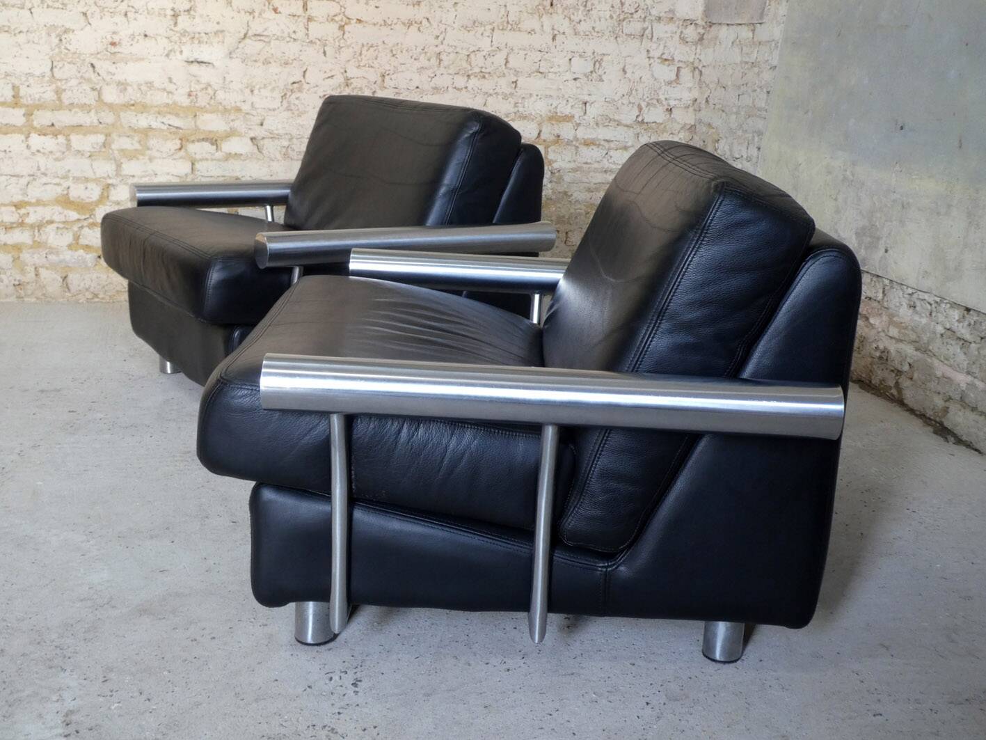 pair of armchairs, black leather & stainless steel, 1990