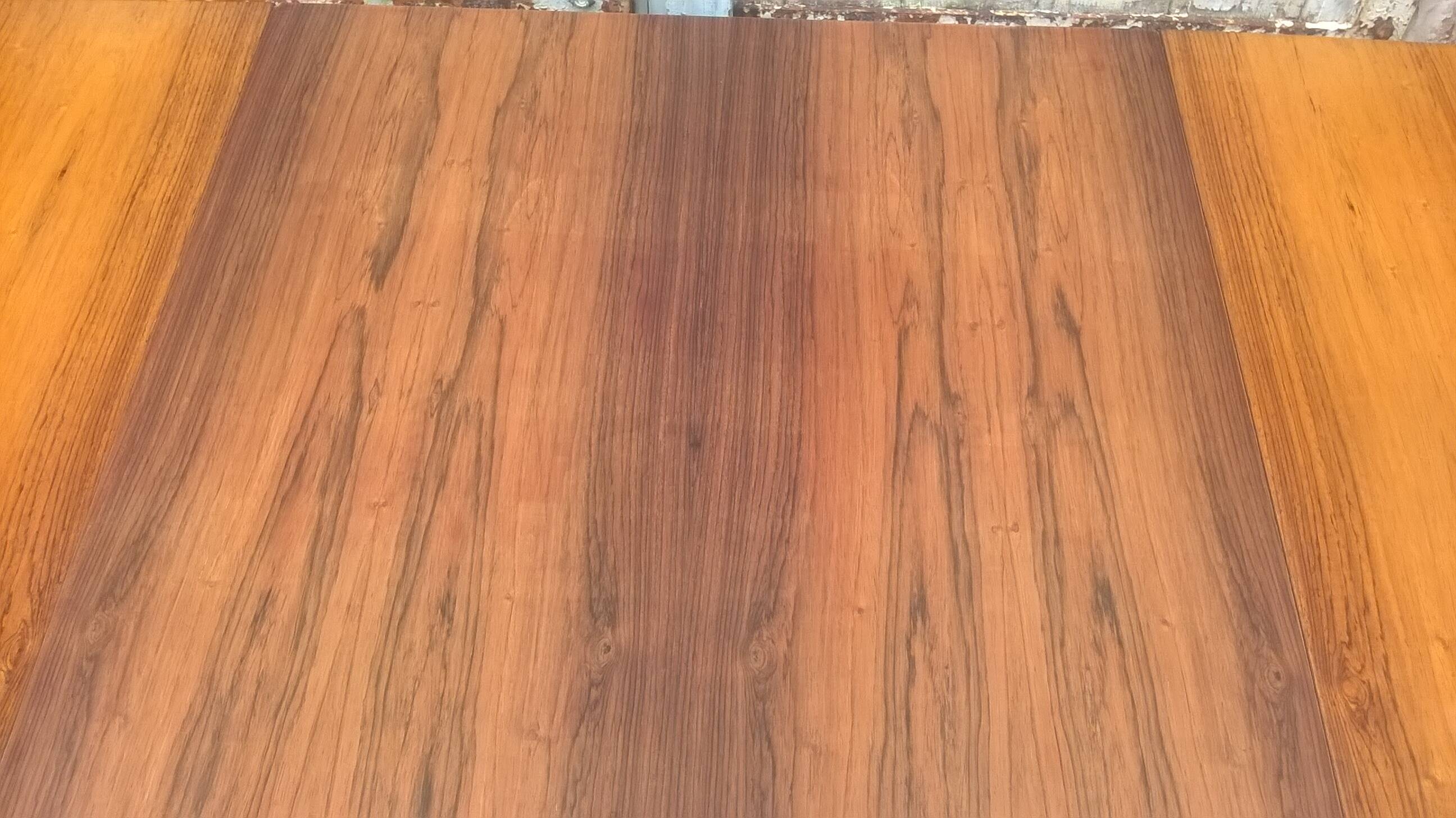 Extendable teak dining table