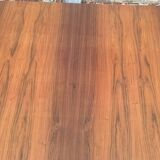 Extendable teak dining table