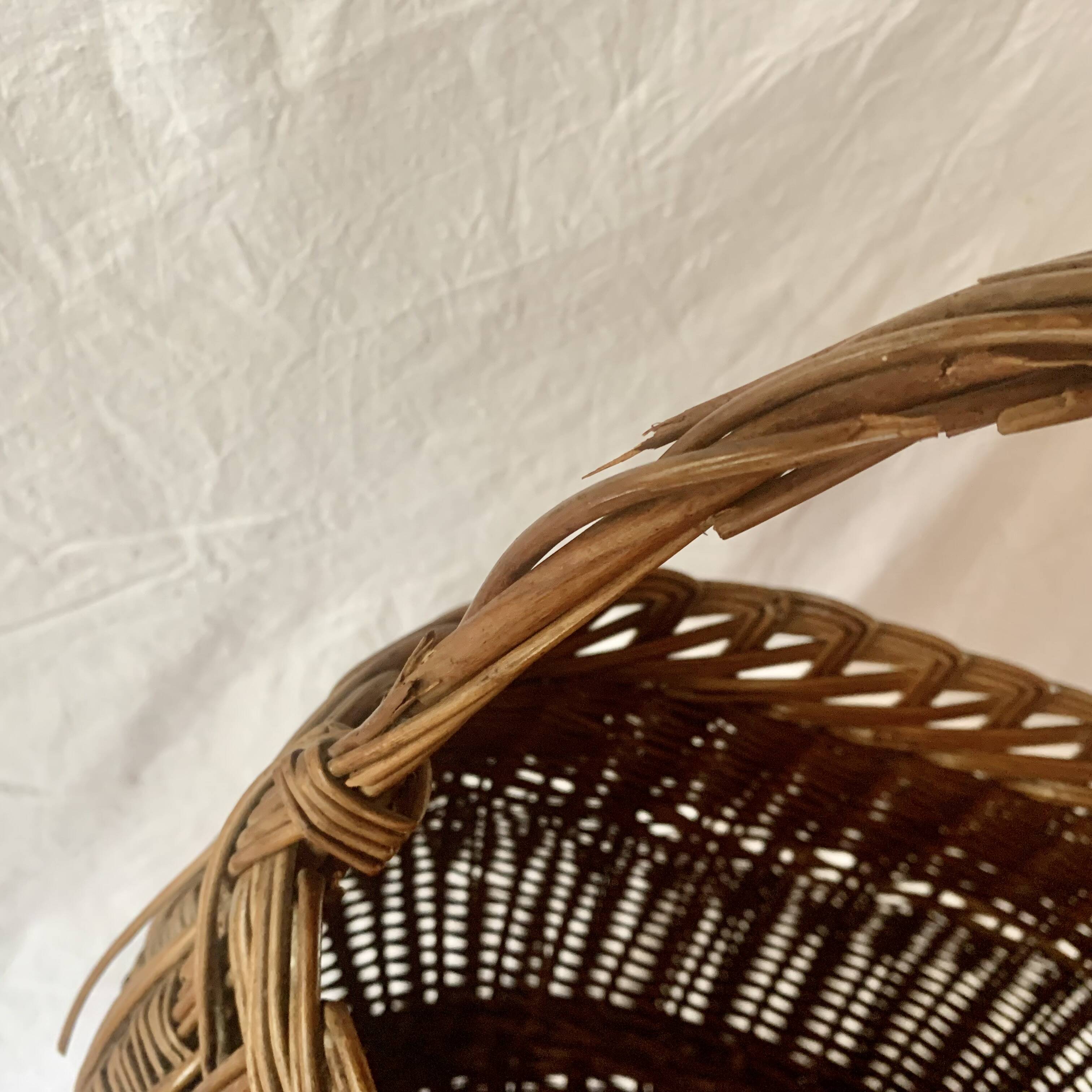 Old woven wicker basket and scoubidou