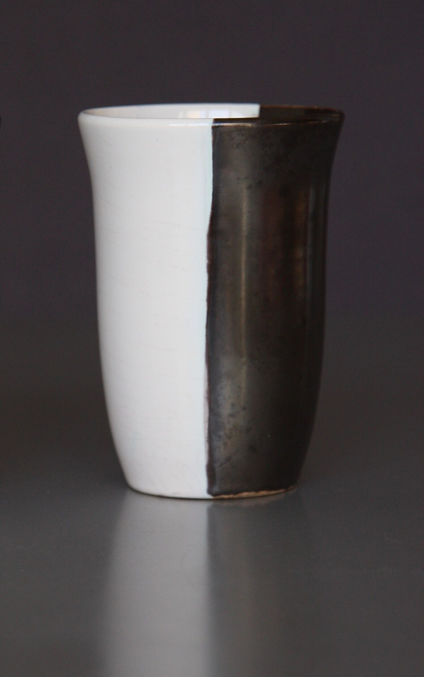 Two-tone porcelain vase, metallic black and white