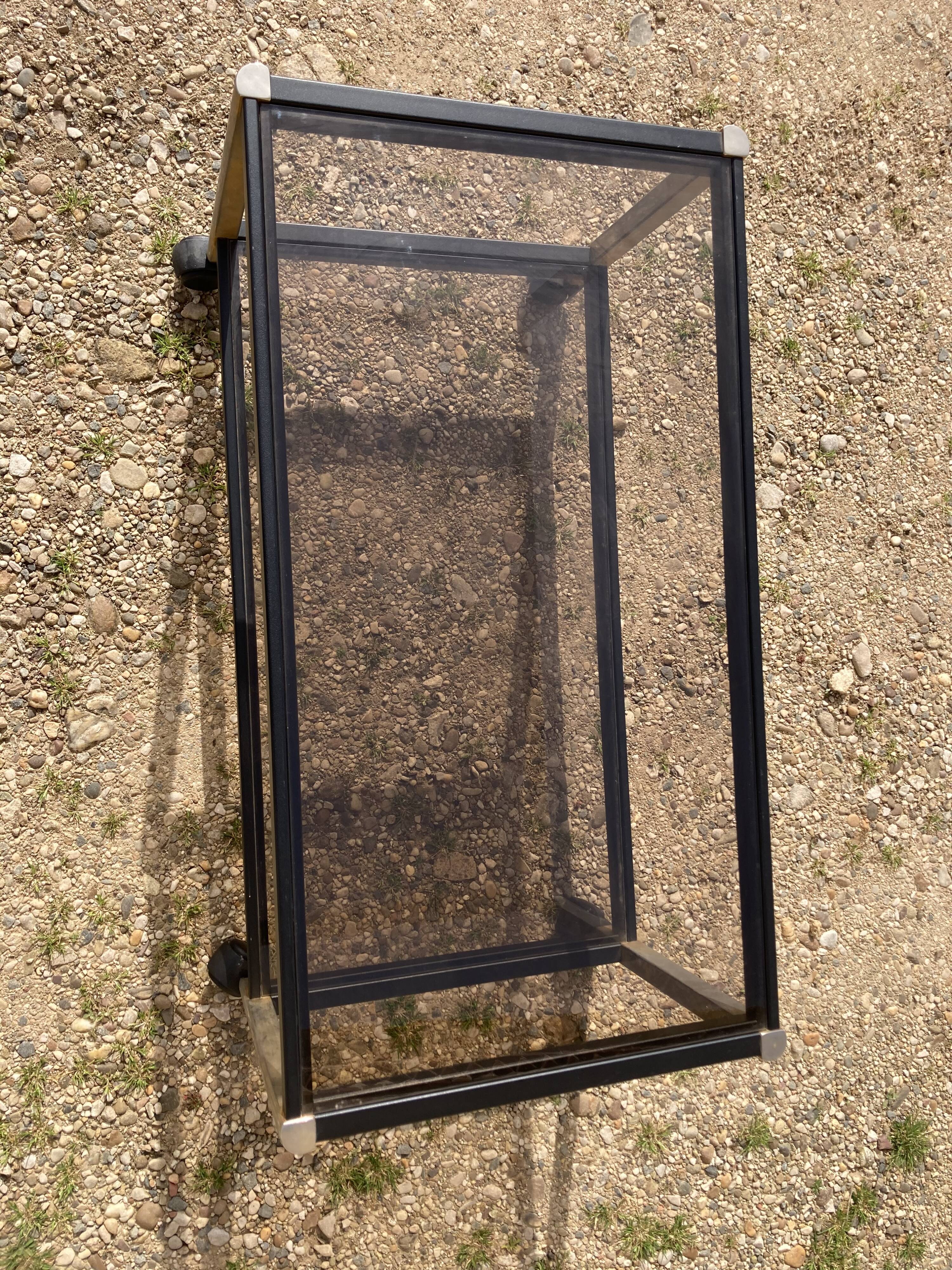 Glass coffee table on wheels