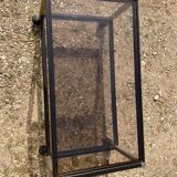 Glass coffee table on wheels