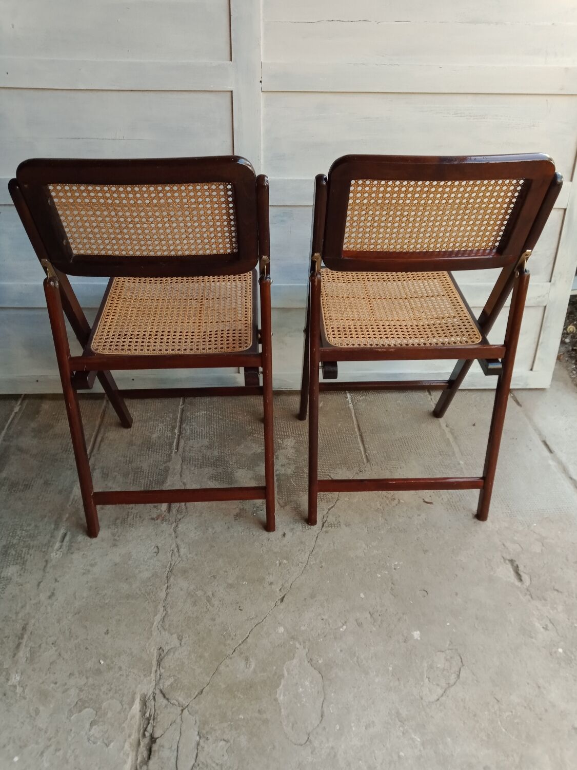 Vintage folding cane and wood chairs