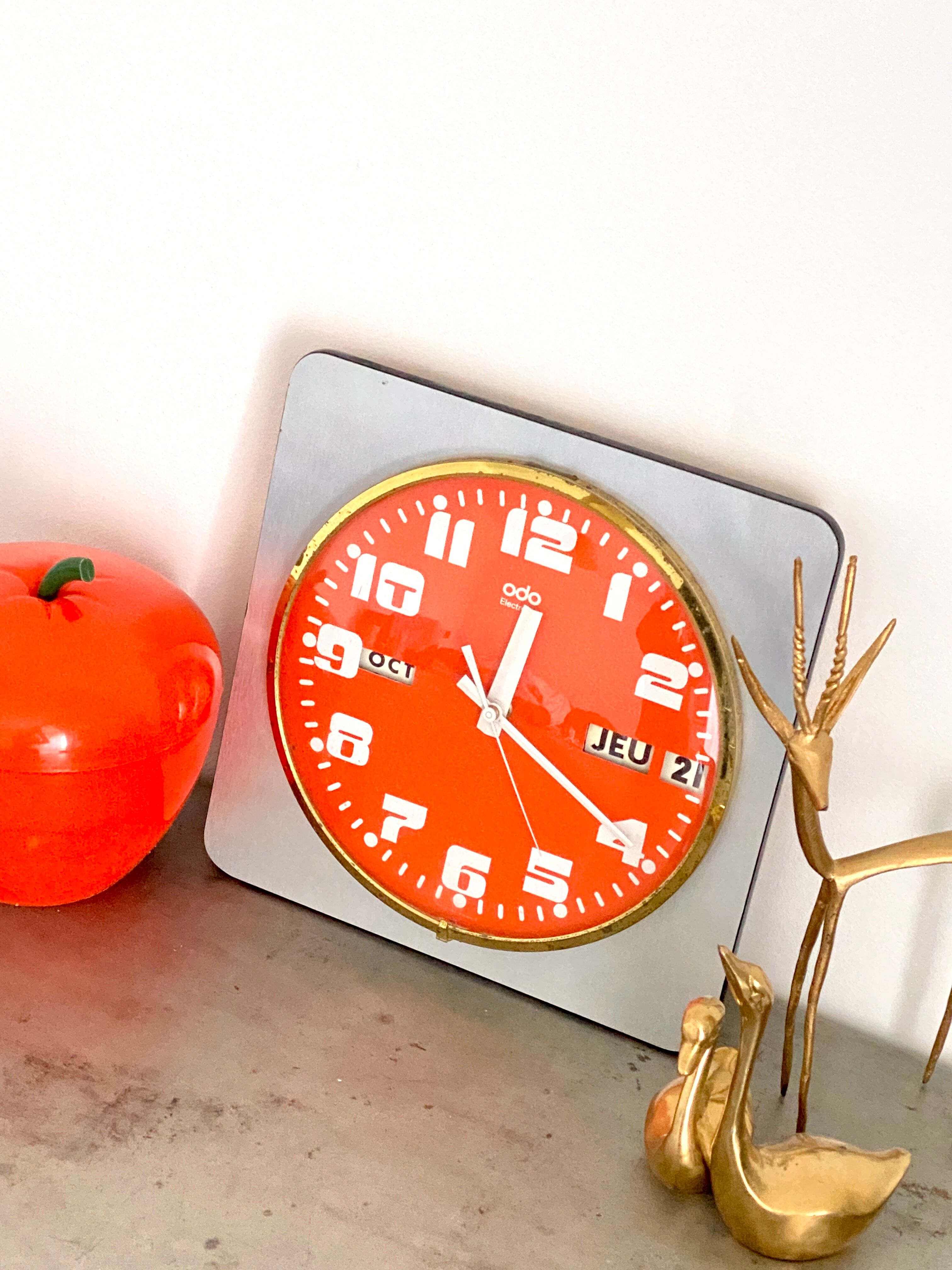 Vintage orange wall clock