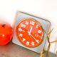 Vintage orange wall clock