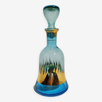 Blue and gold glass carafe