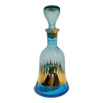 Blue and gold glass carafe