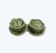Salt and pepper shakers in the shape of a cabbage leaf.