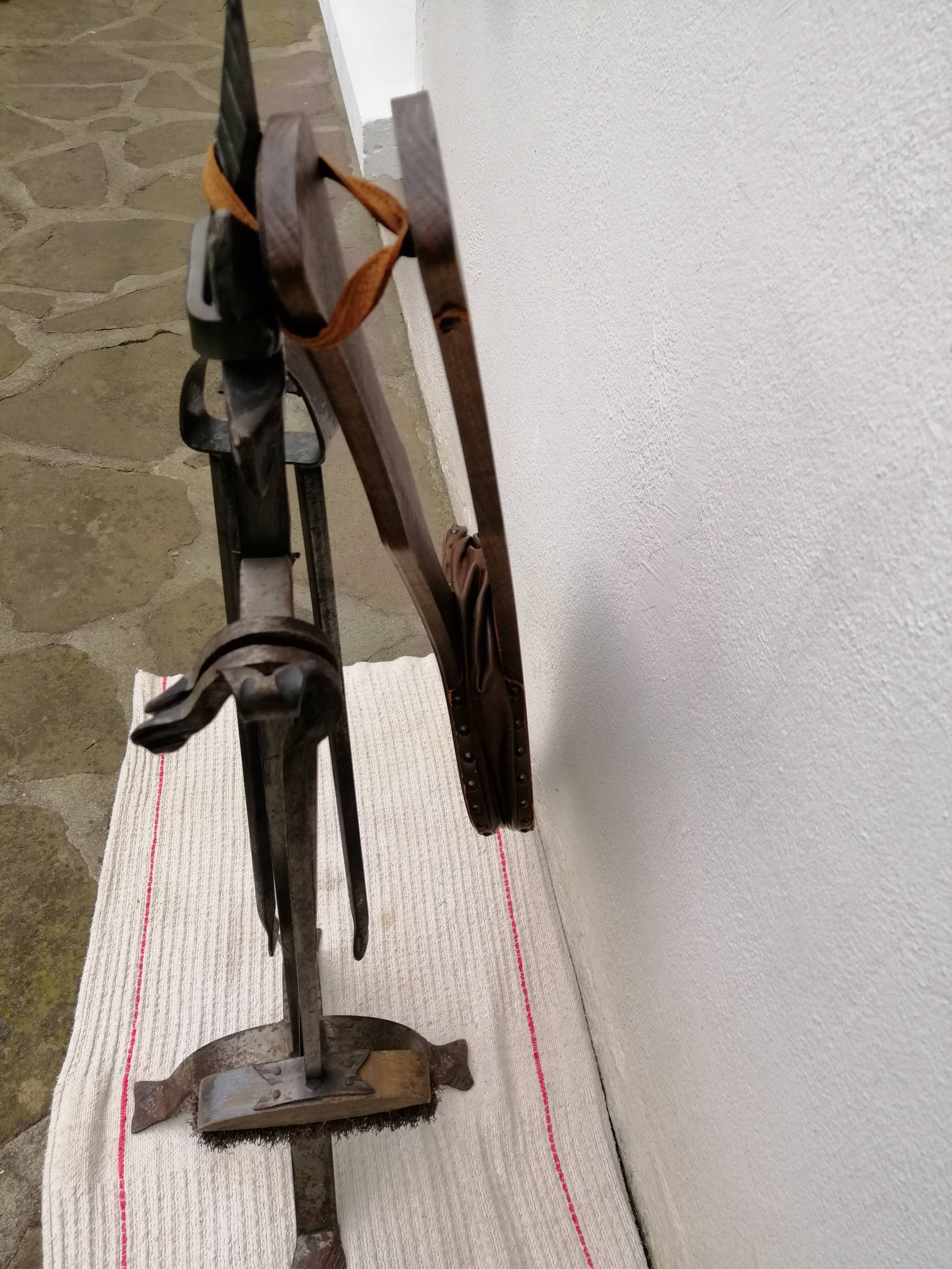 Old wrought iron fireplace servant