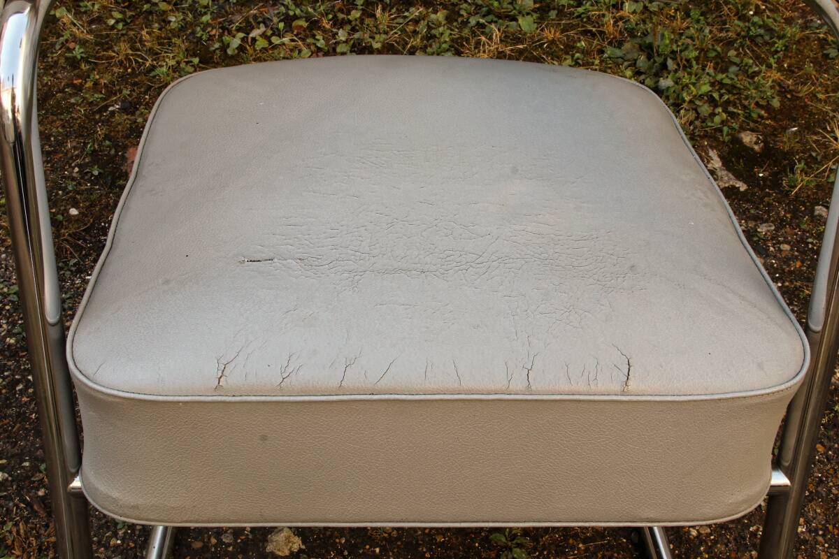 Set of 2 chairs and 1 armchair from the 70s in chrome metal and faux leather.