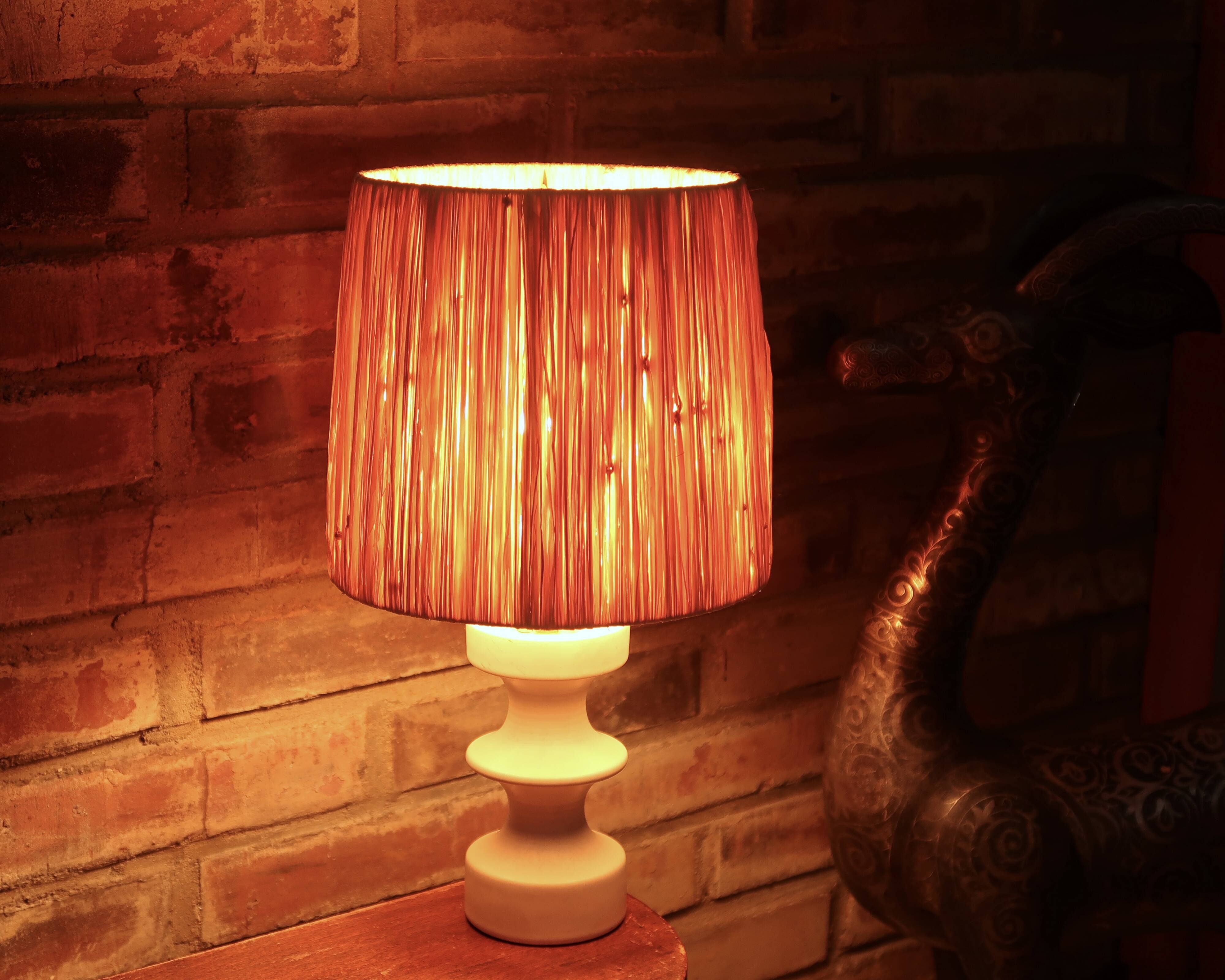 White ceramic lamp by Cari Zalloni, raffia lampshade