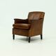 Fauteuil en cuir de mouton patiné années 1950