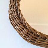 Round mirror in 60s design woven rattan