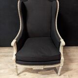 Pair of Louis XVI armchairs with ears in grey painted wood and black fabric