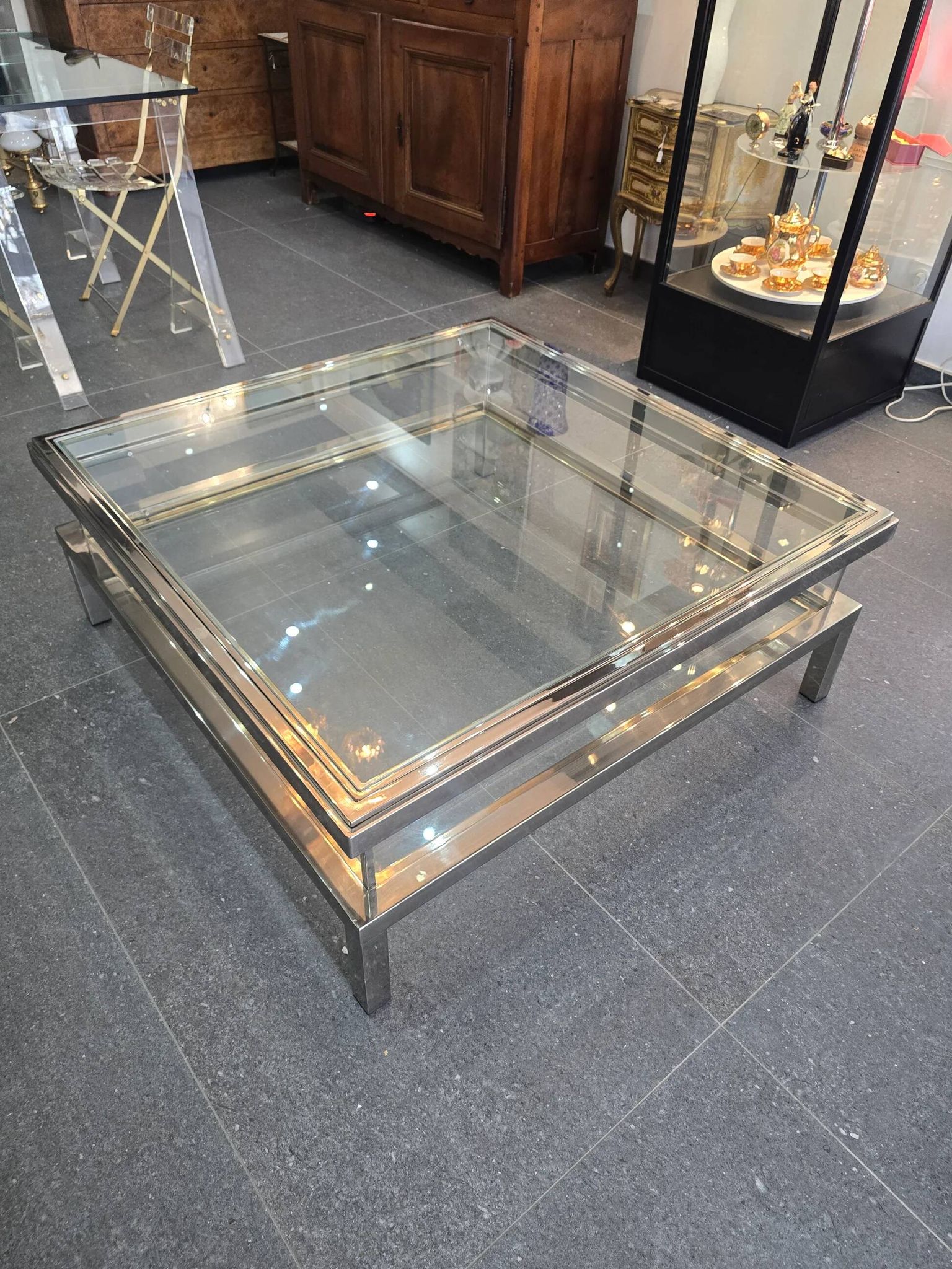 Sliding top coffee table – 70s design – chrome & glass – 108 cm