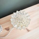 Table lamp with cut glass in the shape of a star.