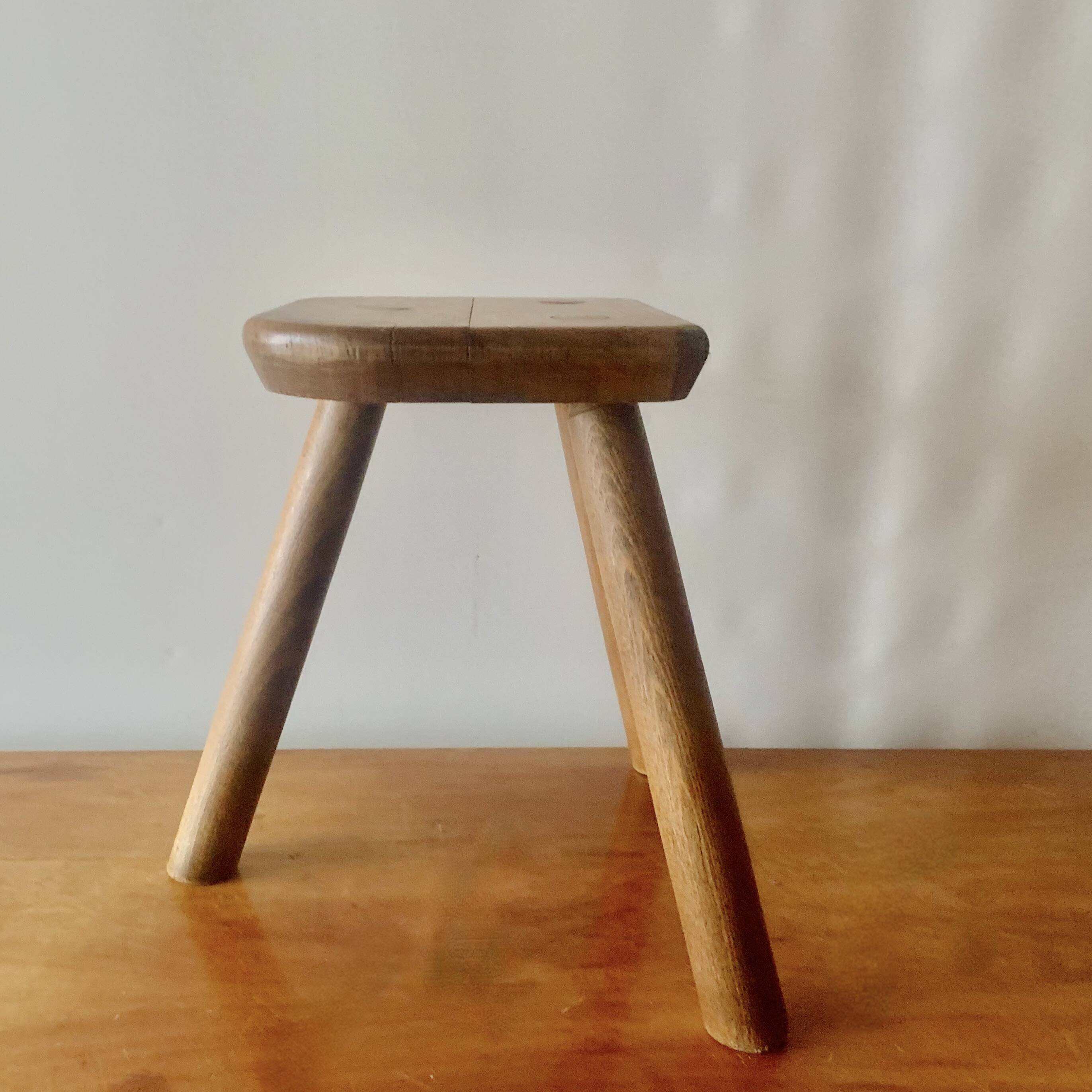 Antique wooden tripod farm stool