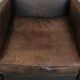 Vintage sheepskin leather design armchair in a dark cognac colour