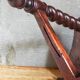 Antique stool in turned and carved solid wood