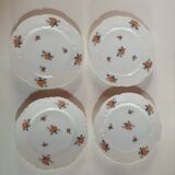 set of 4 dessert plates in white Limoges porcelain with flowers, the edge of one is different