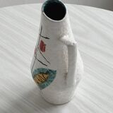 Ceramic flower pitcher.