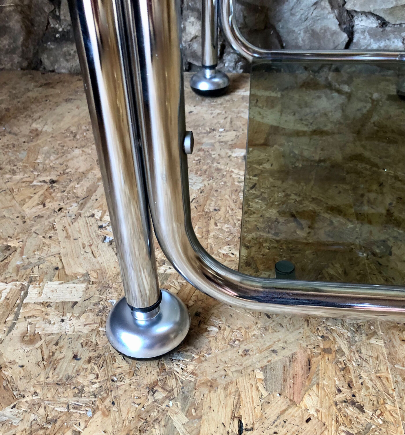 Chromed metal shelf and smoked glass