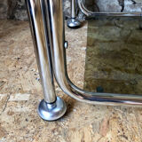 Chromed metal shelf and smoked glass