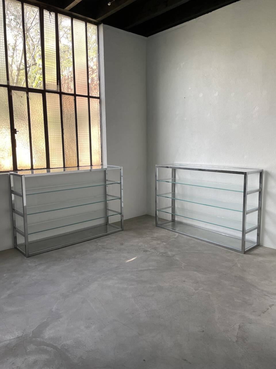 Pair of chrome and glass shelves from the 70s