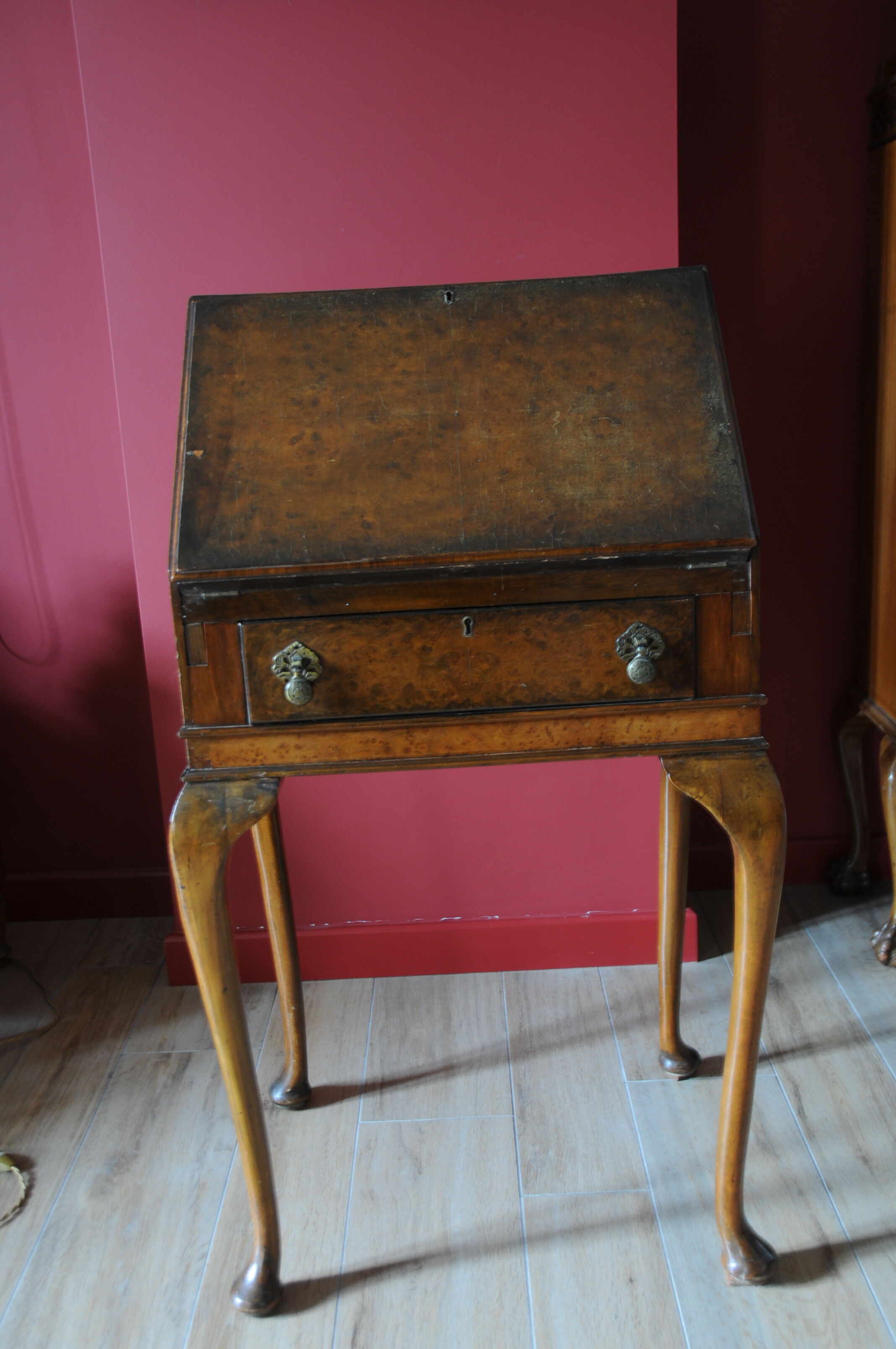 Antique secretary with drop-leaf flap