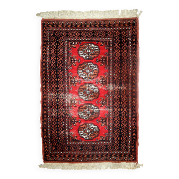 Tapis vintage fait main Lahore en laine rouge (75cm x 119cm) – Années 1960