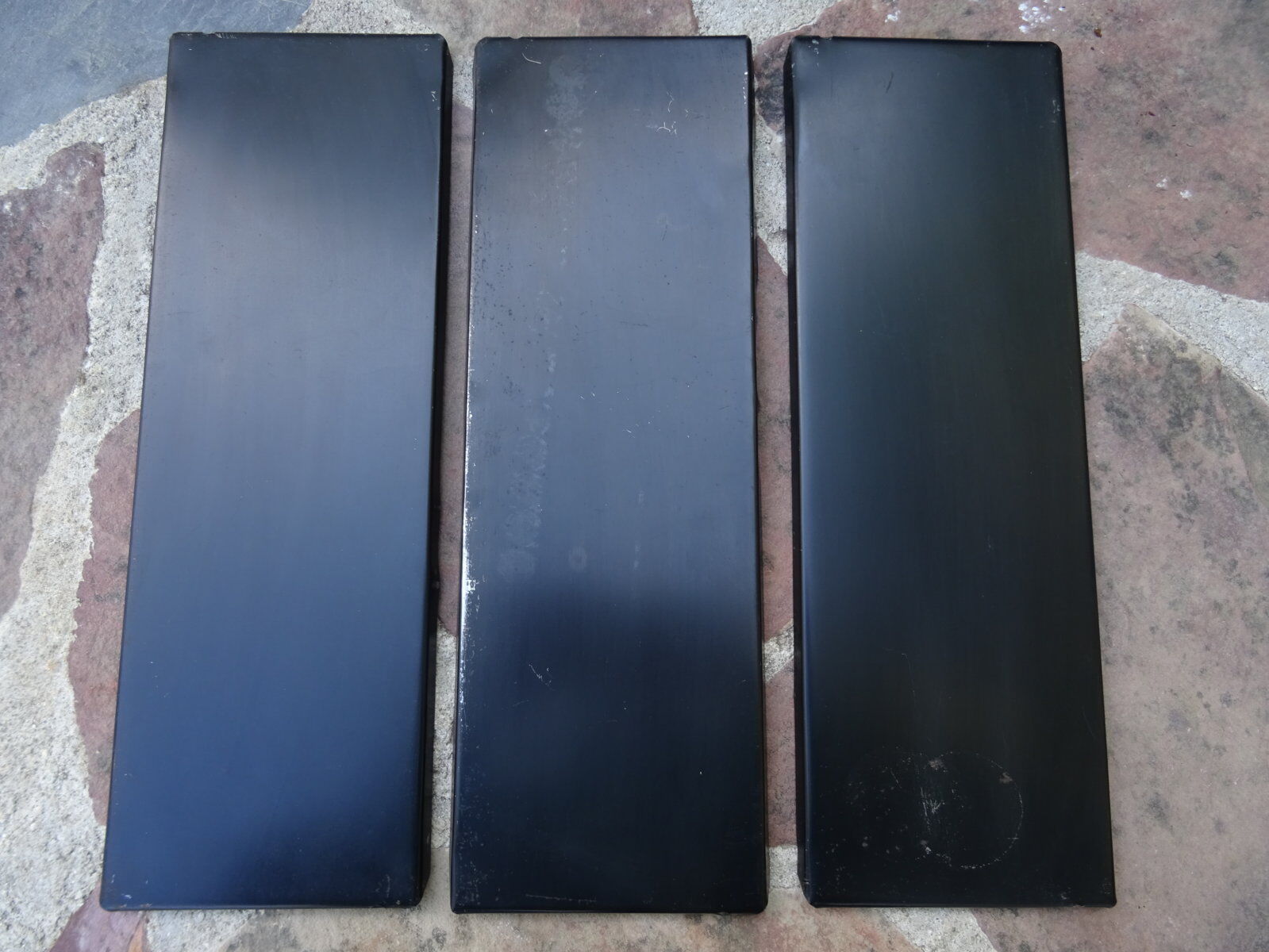 Metal thong wall shelf