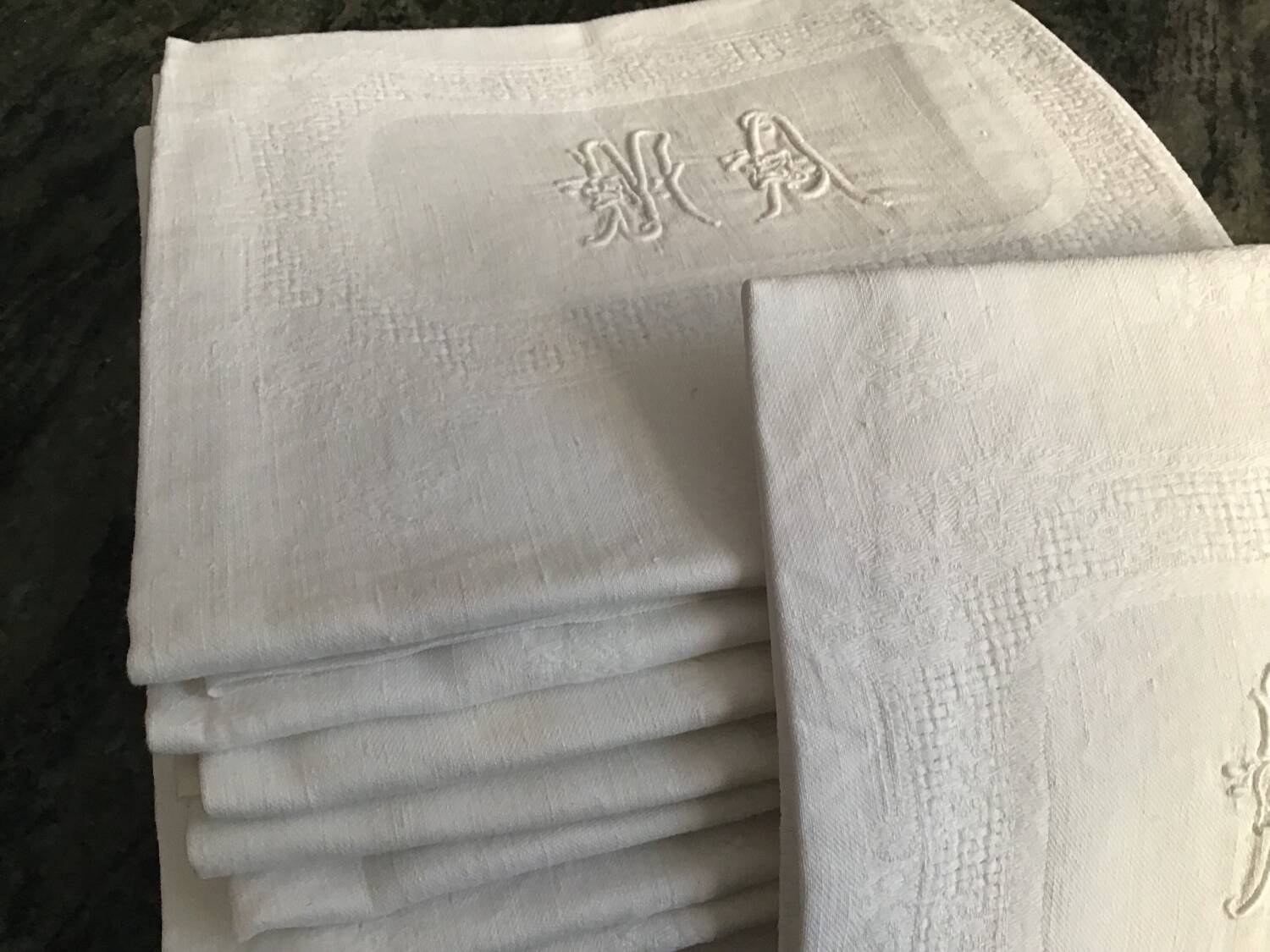 Damask napkins embroidered with an MA monogram