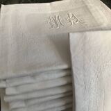 Damask napkins embroidered with an MA monogram