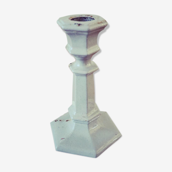 Old enamelled cast iron candlestick
