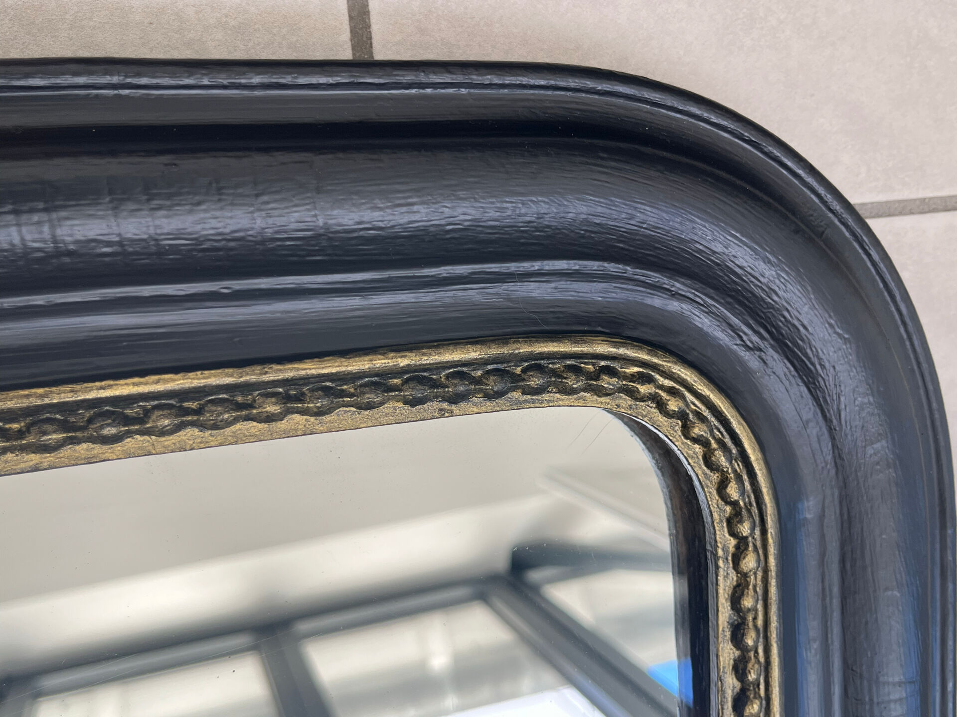 Louis Philippe mirror in black and gold