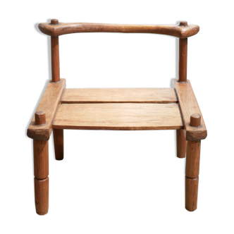Chaise africaine brutaliste ancienne