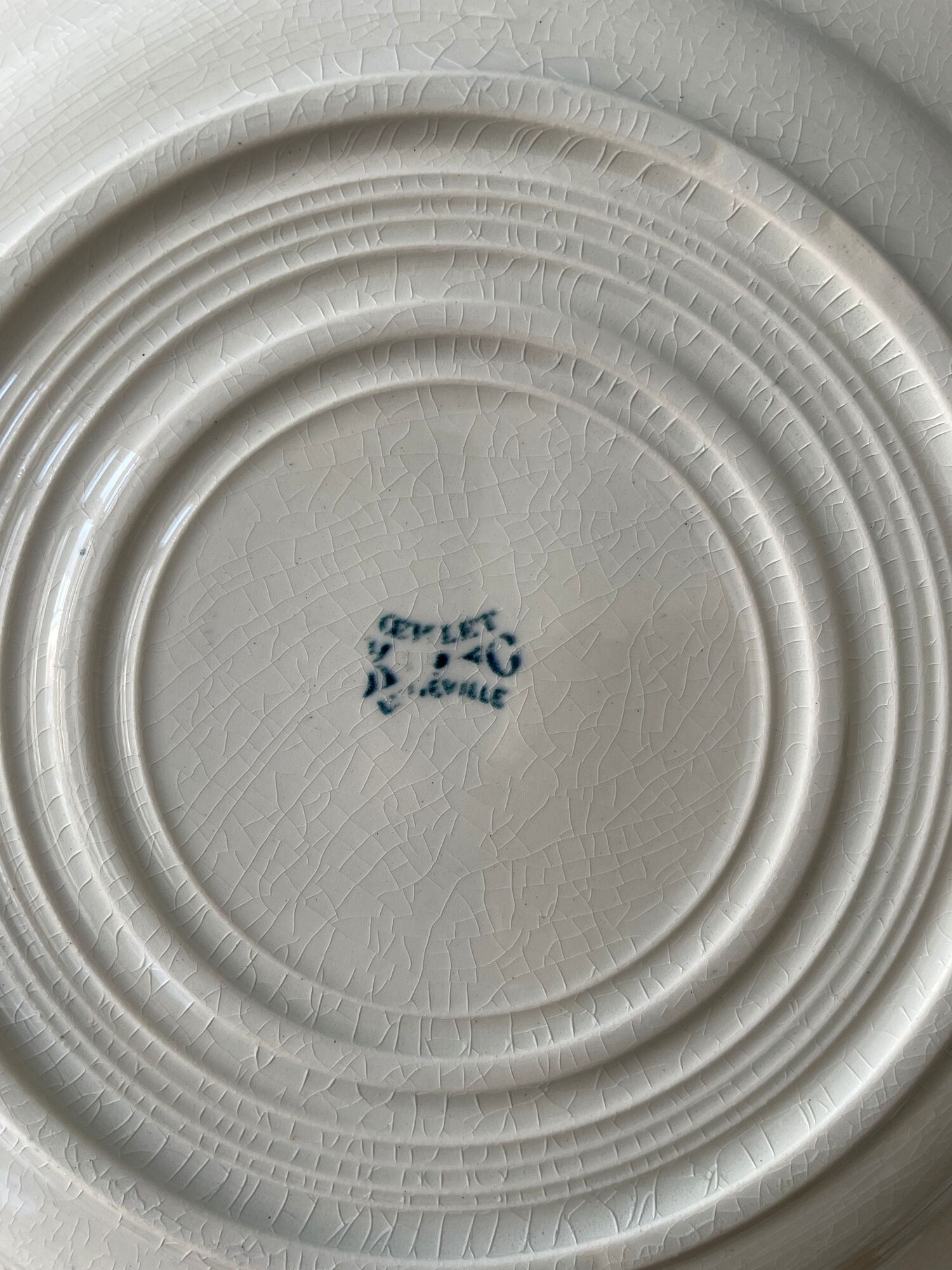 Set of 8 plates Terre de Fer 1900 K.G Lunéville, model "Carnation"