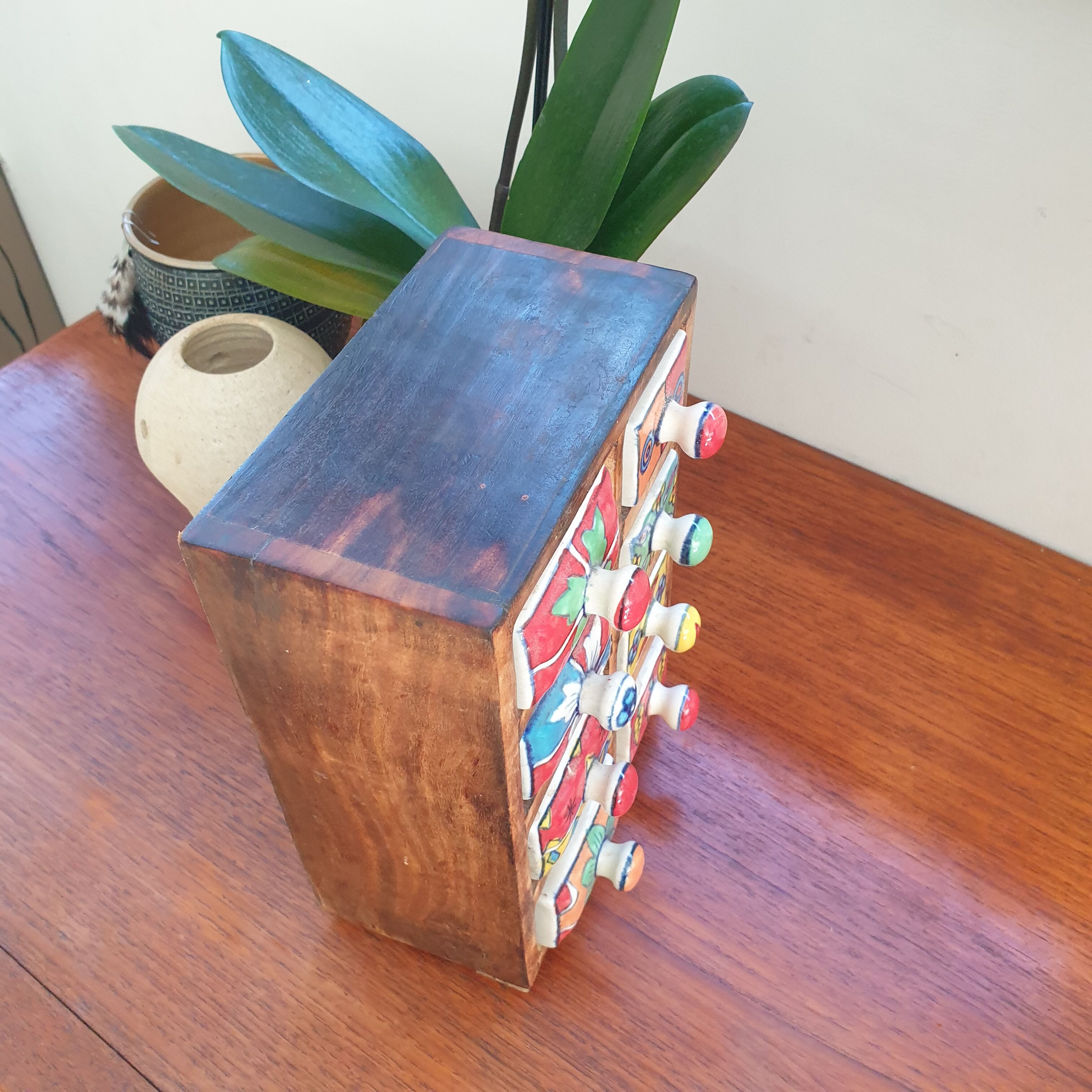Vintage box with wood and ceramic drawers