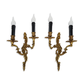 Pair of Louis XV style bronze wall lamps