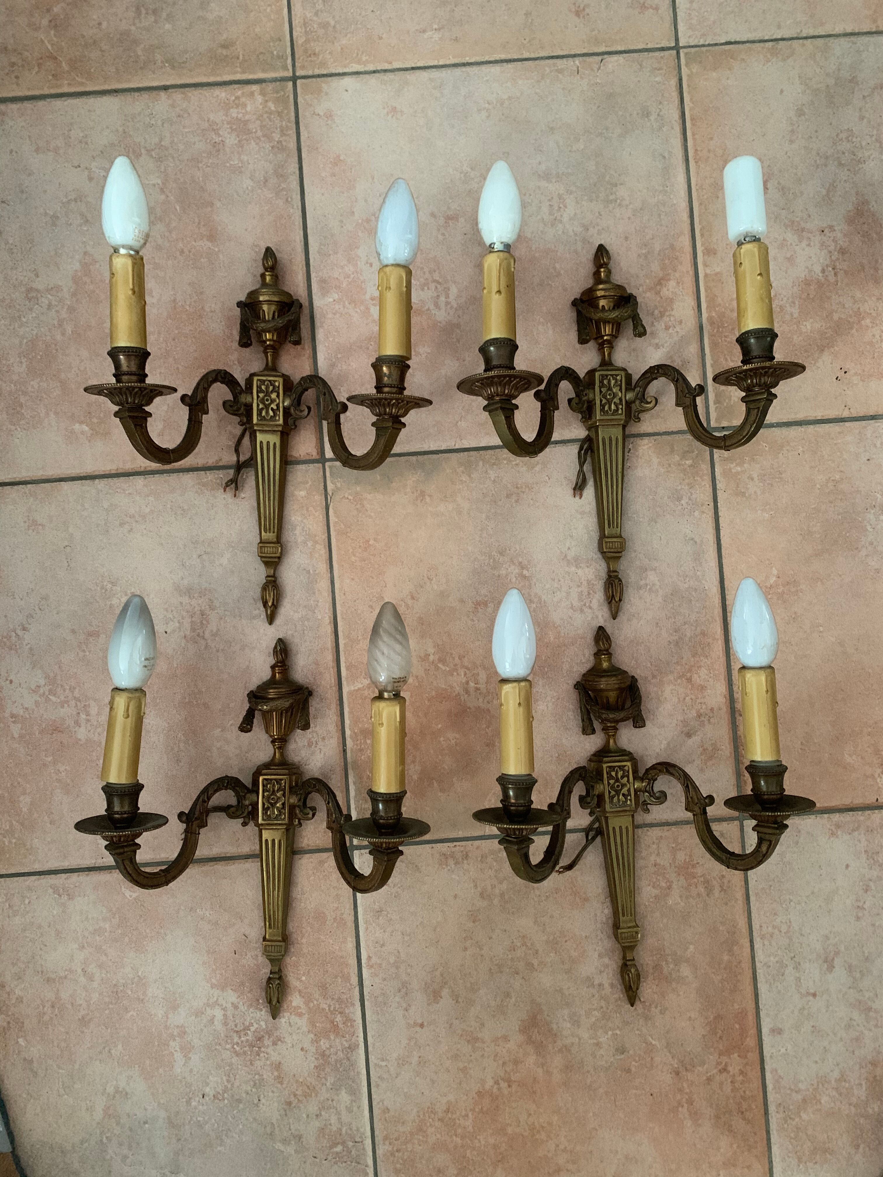 Double brass sconces